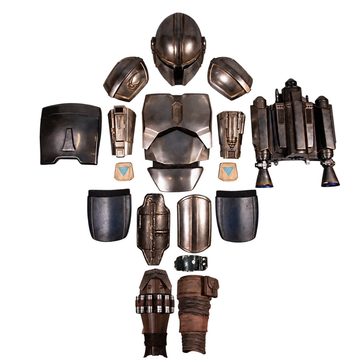 Metallic costume armor, helmet, jetpack and leg components arranged separately